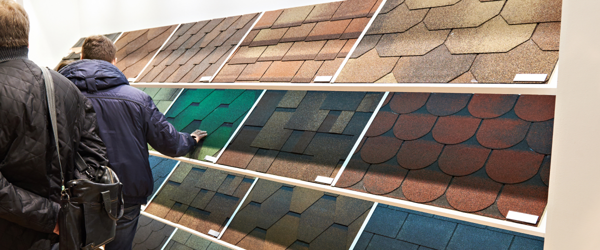 People in a roofing store looking at optional roofing materials.